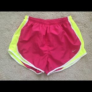 Nike pink and yellow running shorts