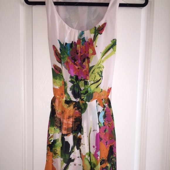 Bright floral dress with matching belt/sash.
