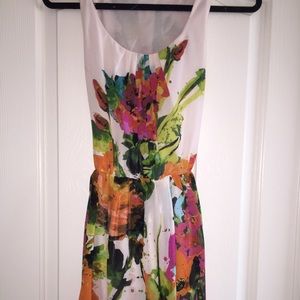 Bright floral dress with matching belt/sash.