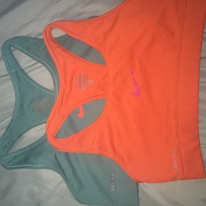 Teal and orange Nike sports bras