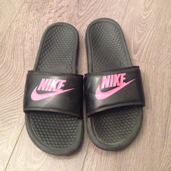 Black and pink nike slides or sandals