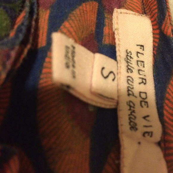 A printed tank top. It buttons up in the front. - Picture 2 of 3