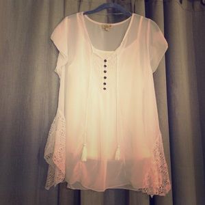 Lacy see through tee with attached white tank top.