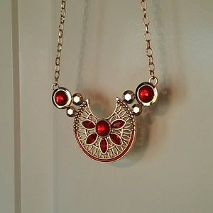 Bib necklace with red gems