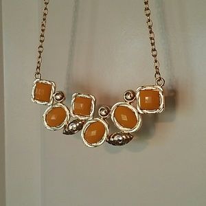Bib necklace with yellow gems