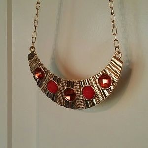 Bib necklace with red gems