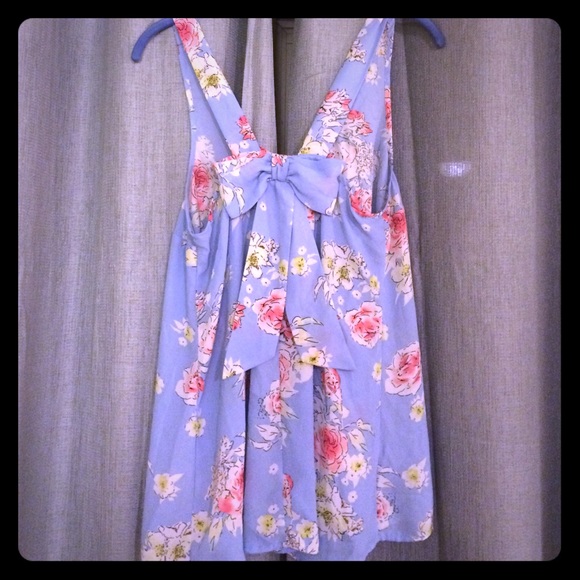 Flower print top with bow detail.