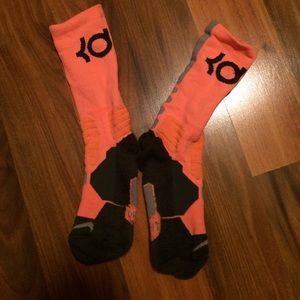 KD socks and pink underarmor socks