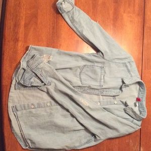 Denim shirt.