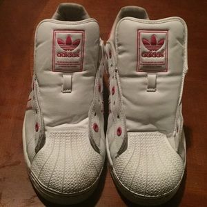 Pink and white Adidas