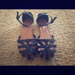 Black woven sandals