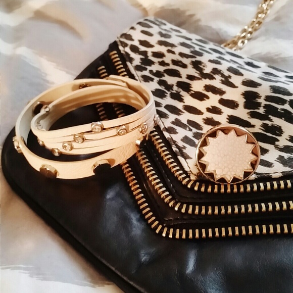 Rhinestone + gold studded cuff