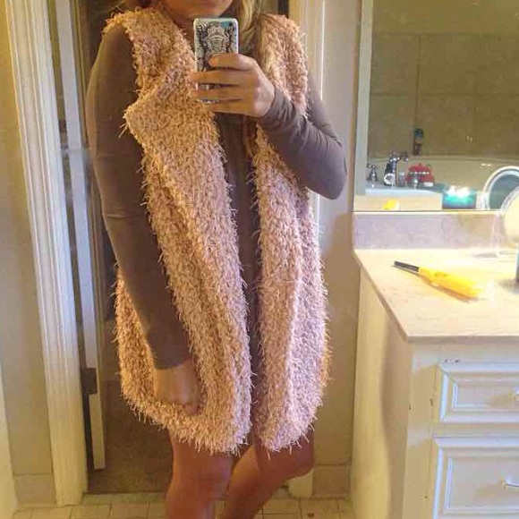 Pink fuzzy vest