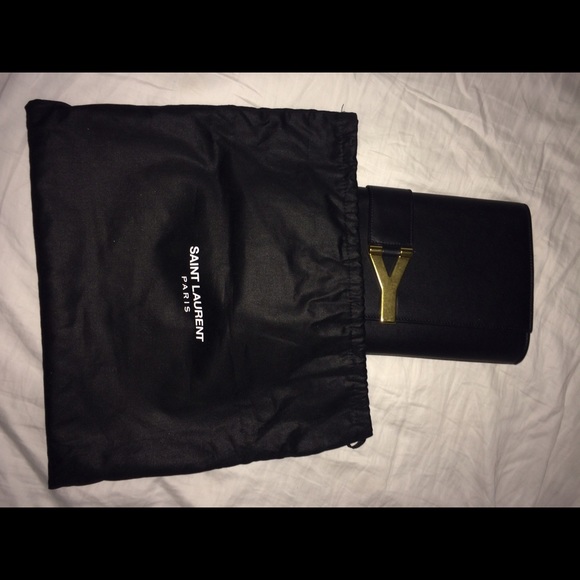 Authentic St Laurent classic black Y clutch.