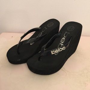 Bebe wedge flip flops