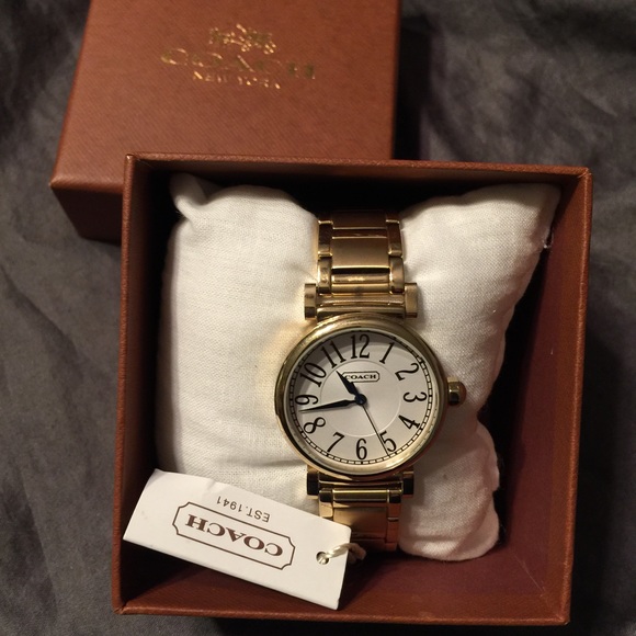 Gold coach watch