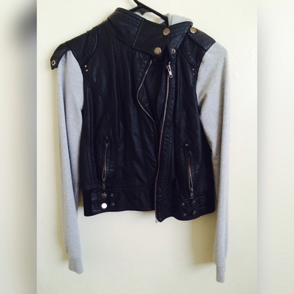 Leather jacket with sweater sleeves
