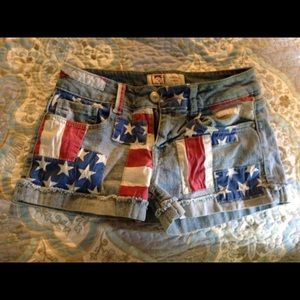 Patriotic patched jean shorts