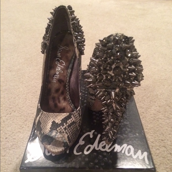 Snakeskin studded peep toes