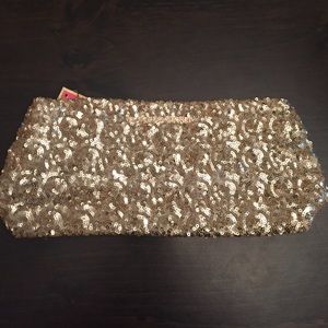 Brand new gold sequin Victoria Secret makeup bag!