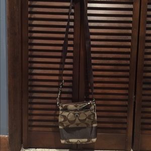 Brown cross body coach purse-never been used!!