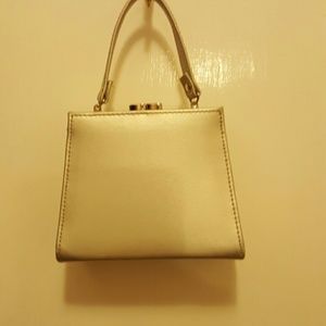 Mini silver clutch