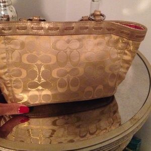 Gold Coach bag .