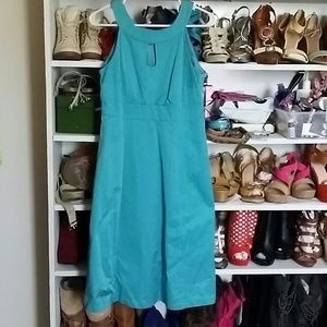 Key-hole blue dress.