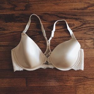 NUDE LACE BRA.