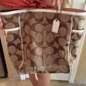 Signature Coach pattern with snakeskin!