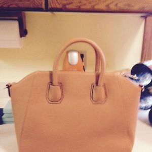 Just fab tan purse brand new never used.