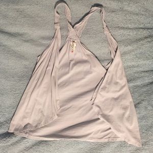 Loose vest with lace straps