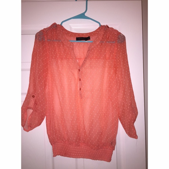 Coral with white polka dot blouse