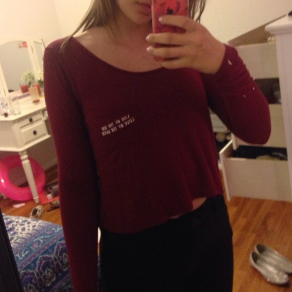 red "live by the sun" long sleeve pocket tee