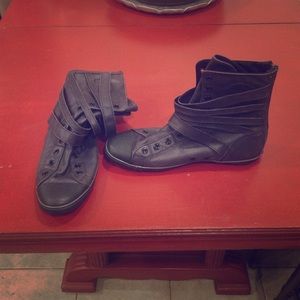 Distressed Converse High Tops