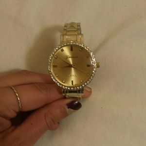 Gold Geneva watch