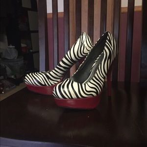 Zebra print high heals with red heal