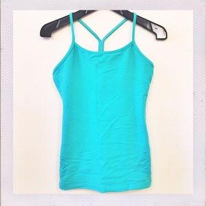 Lulu power y tank with Herbalife logo.