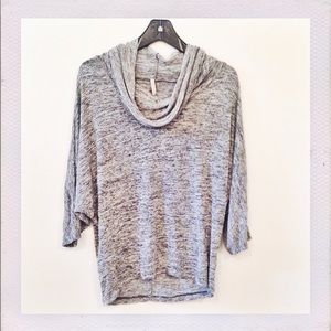 Heathered, gray top by Olivia Moon.