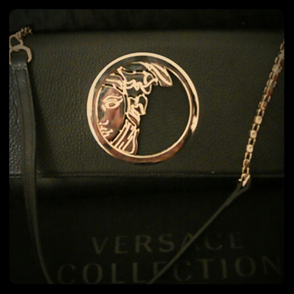 Black leather Versace shoulder bag/clutch