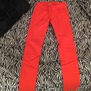 Orange skinny jeans