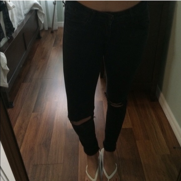 Black knee ripped skinny jeans