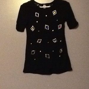 A black bedazzled shirt
