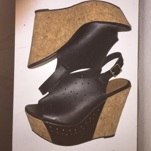 De Blossom, cork and leather platform wedges.