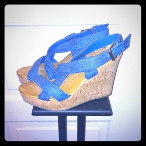 Teal strappy cork wedges.