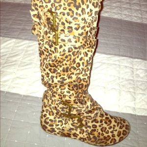 Leopard zip up calf boots.