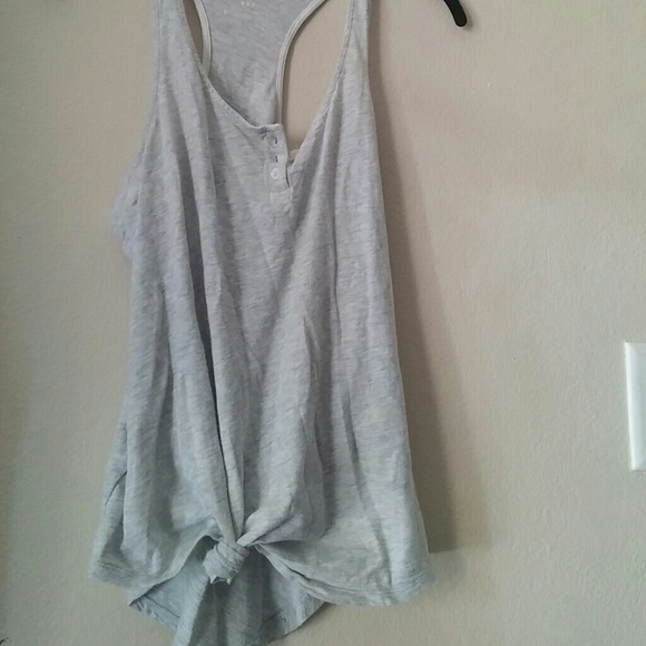 Light Heather grey racer-back tank top.