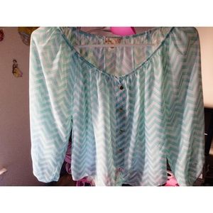 A blue shirt with white stripes