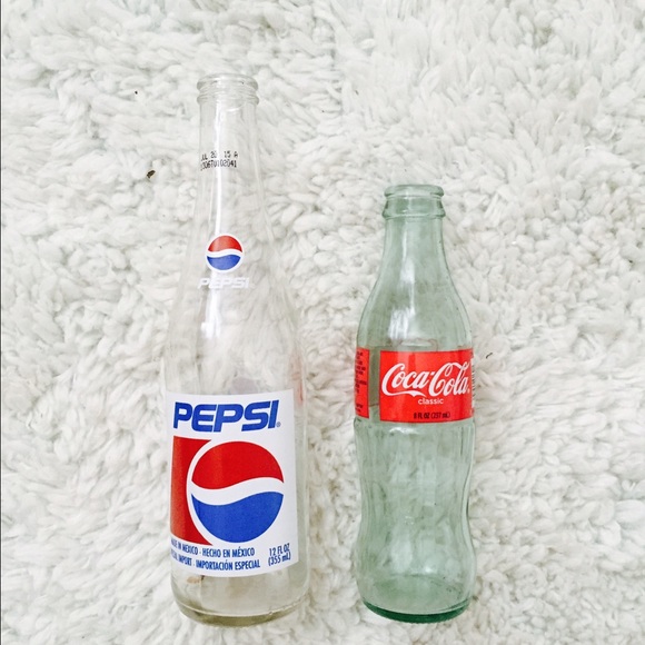 Vintage coke and Pepsi bottles.