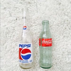 Vintage coke and Pepsi bottles.
